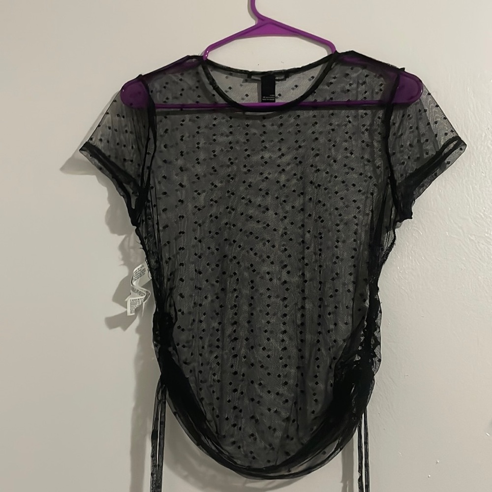 See through blouse.